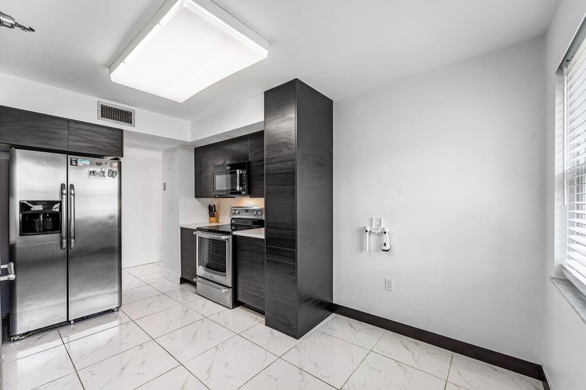 SELLER WILL PAY CONDO DUES FOR BUYER FOR REMAINDER OF 2026!!! - photo 12