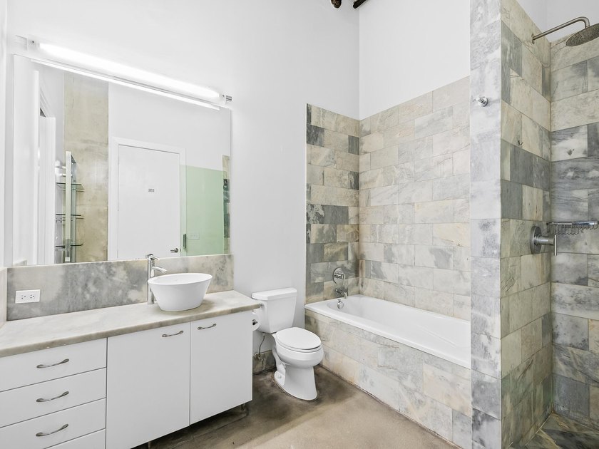 Step into this light filled, loft style studio in the heart of - photo 12
