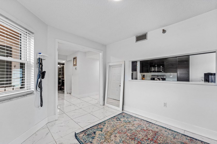 SELLER WILL PAY CONDO DUES FOR BUYER FOR REMAINDER OF 2026!!! - photo 13