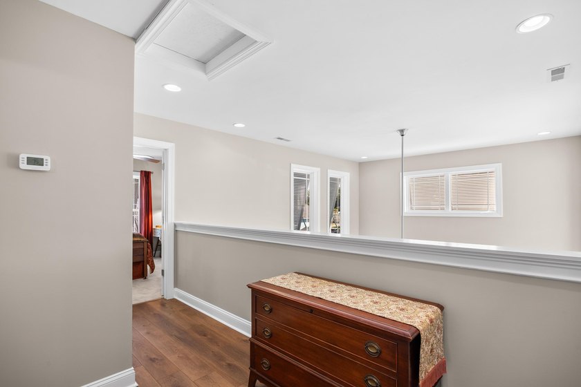 Beautifully updated Garden City beach home offering modern - photo 26