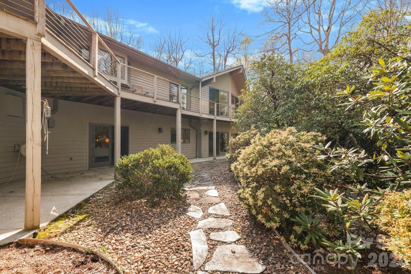 Step into this Kenmure home that feels like a private retreat - photo 4