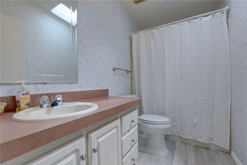 Spacious home situated on a desirable double lot, featuring an - photo 22