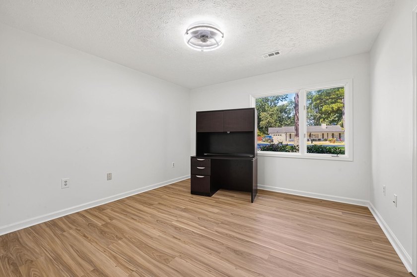 Three-bedroom, two-bathroom, single-story ranch home with a - photo 14