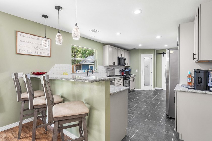 Beautifully renovated home tucked away on a quiet cul-de-sac in - photo 11