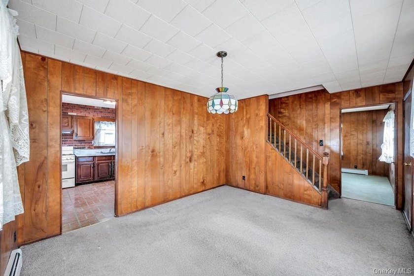 Introducing this charming and spacious Cape-style home featuring - photo 3