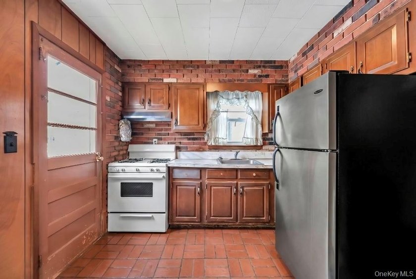 Introducing this charming and spacious Cape-style home featuring - photo 5