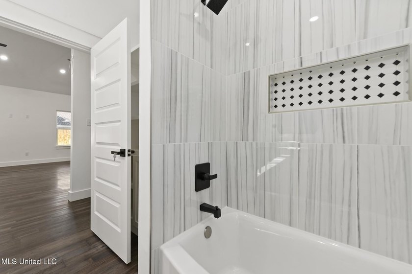 This beautifully crafted new construction home offers 4 bedrooms - photo 25