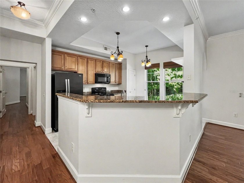 A RARE GEM! True 4 bedroom condos are rare to find in the - photo 11