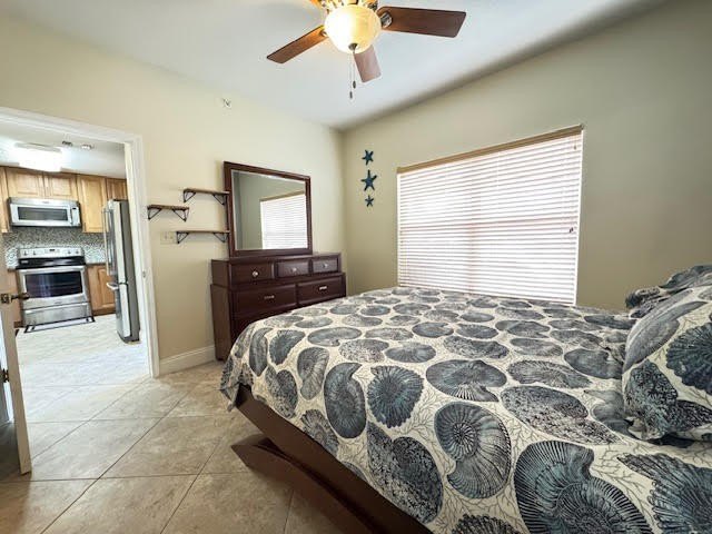 This fully furnished ground floor condo has tile floor and - photo 15