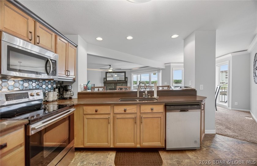 This stunning 2-level condo at Regatta Bay is everything a lake - photo 16