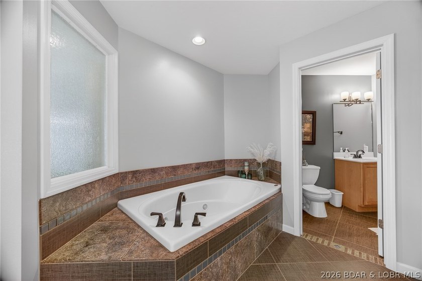 This stunning 2-level condo at Regatta Bay is everything a lake - photo 28