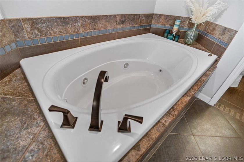 This stunning 2-level condo at Regatta Bay is everything a lake - photo 29