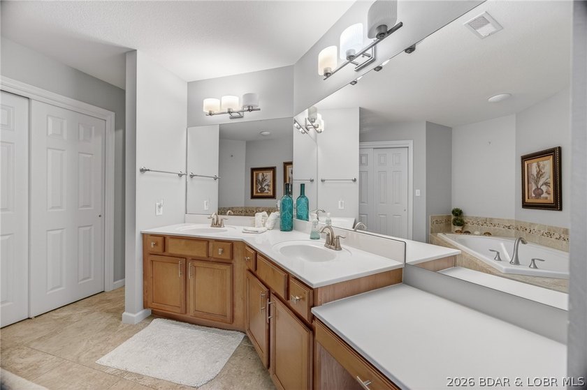 This stunning 2-level condo at Regatta Bay is everything a lake - photo 40