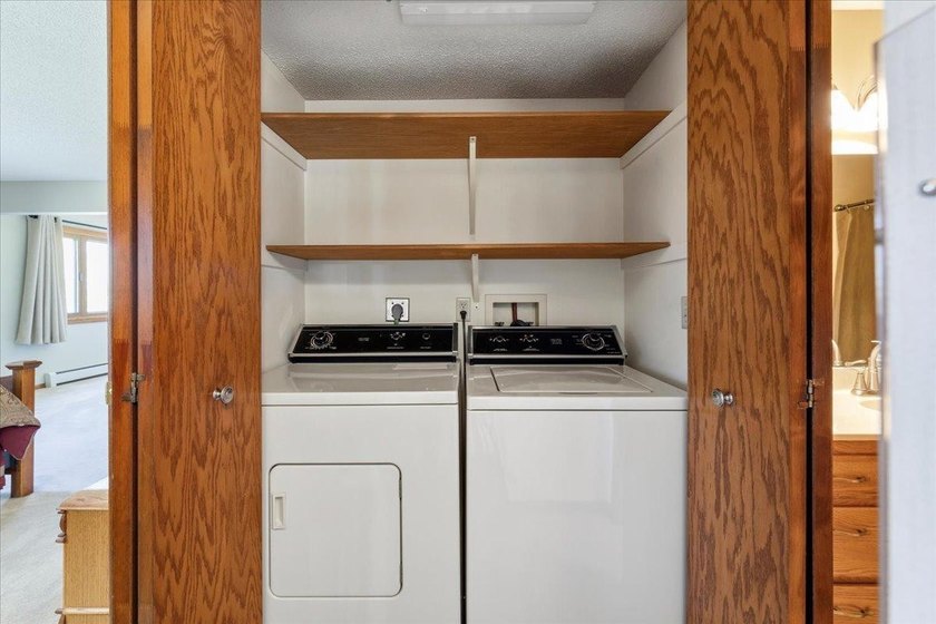 Welcome to easy, low-maintenance living in the highly - photo 11