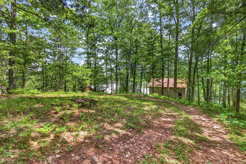 Enjoy stunning water views from this 2-bedroom, 1-bathroom cabin - photo 21