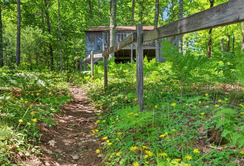 Enjoy stunning water views from this 2-bedroom, 1-bathroom cabin - photo 24