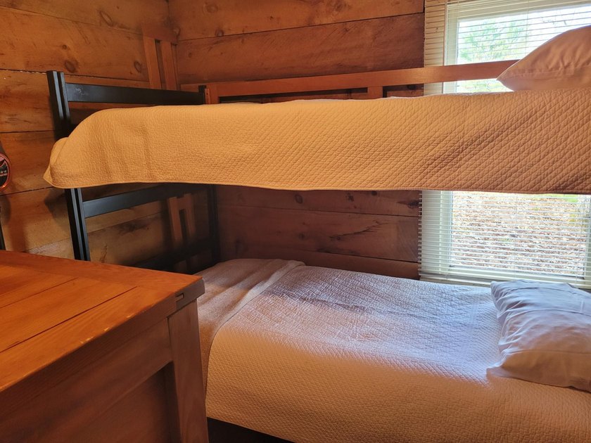Enjoy stunning water views from this 2-bedroom, 1-bathroom cabin - photo 37