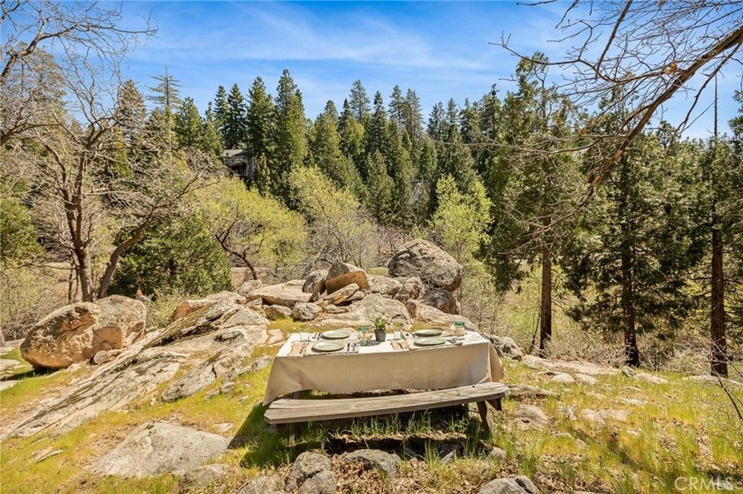 Whispering Pines Lodge. Tucked among towering pines in one of - photo 2