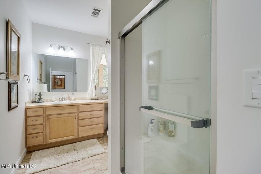 Nestled in a highly desirable golf cart community, this spacious - photo 14