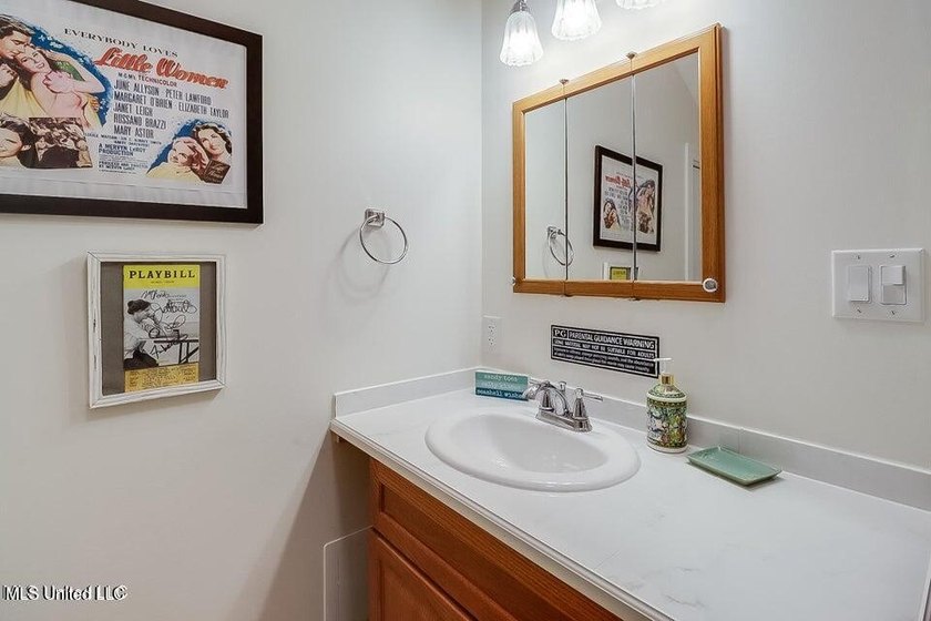 Nestled in a highly desirable golf cart community, this spacious - photo 17