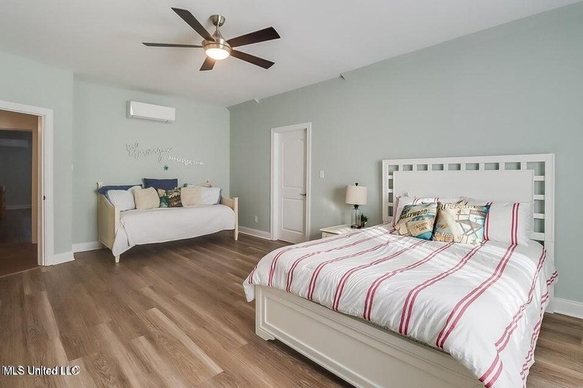 Nestled in a highly desirable golf cart community, this spacious - photo 19