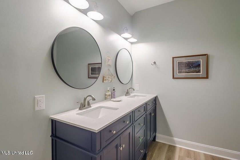 Nestled in a highly desirable golf cart community, this spacious - photo 22