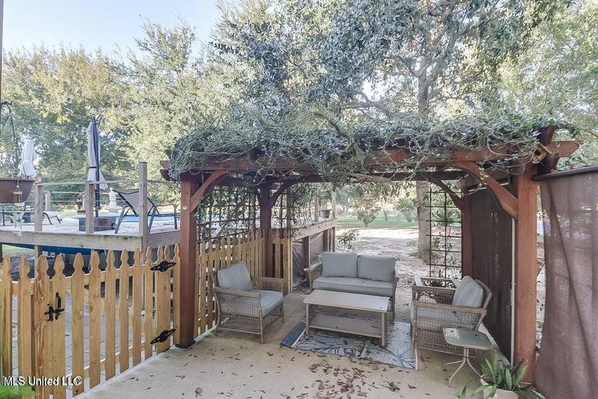 Nestled in a highly desirable golf cart community, this spacious - photo 27
