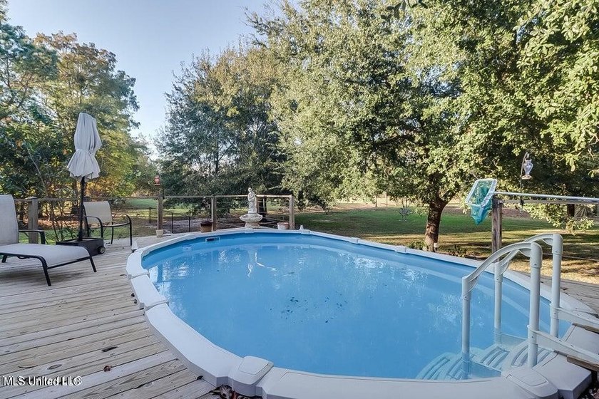 Nestled in a highly desirable golf cart community, this spacious - photo 29