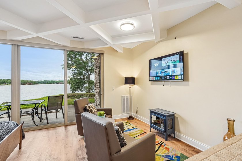 Experience luxury lakeside living on Lake Delton in this - photo 12