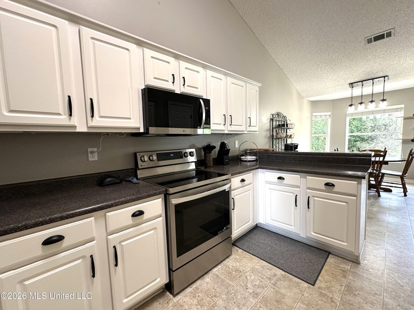 Very well-maintained low maintenance move in ready home. Home is - photo 13