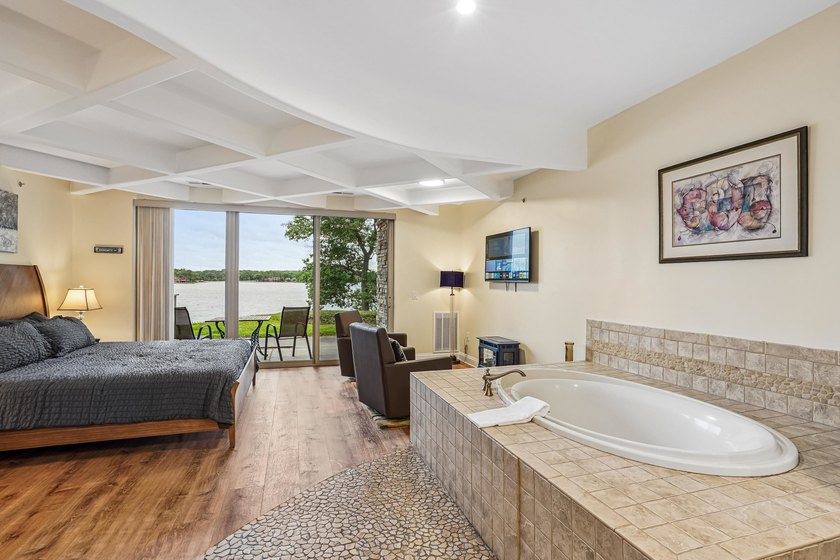 Experience luxury lakeside living on Lake Delton in this - photo 23
