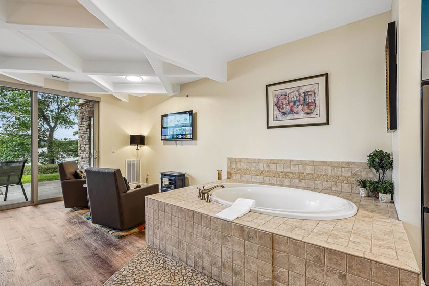 Experience luxury lakeside living on Lake Delton in this - photo 24