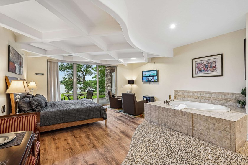 Experience luxury lakeside living on Lake Delton in this - photo 27