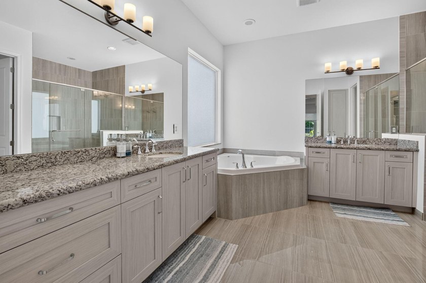Impeccably upgraded 4-bedroom, 4-full-bath Geneva model in the - photo 18