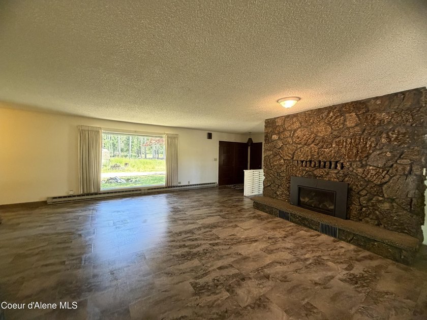 Enjoy waterfront living with this 3-bedroom, 2-bath home - photo 3