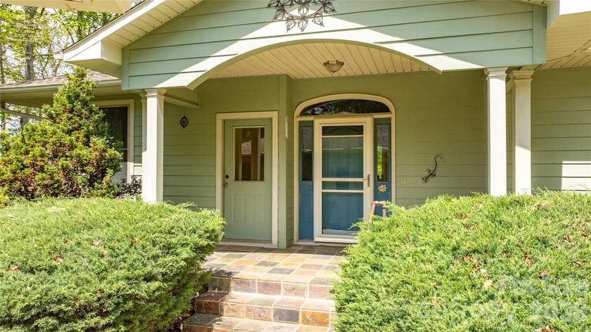 Tucked within a desirable lake community, this thoughtfully - photo 2