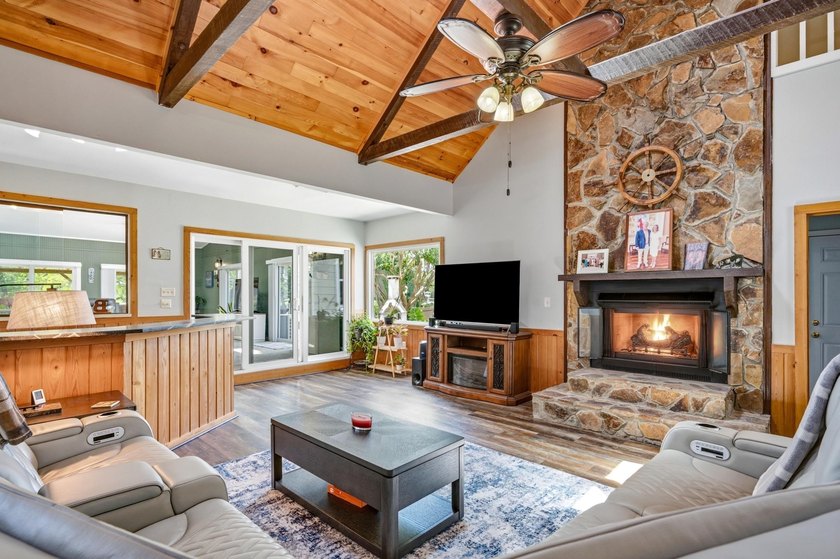 This unique waterfront oasis is located directly on the Black - photo 22