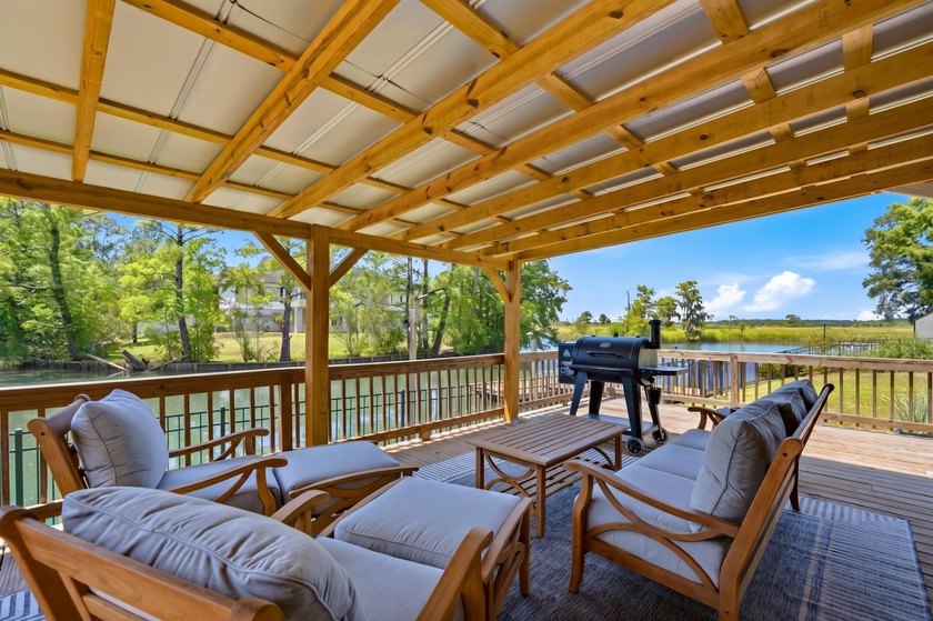 This unique waterfront oasis is located directly on the Black - photo 28