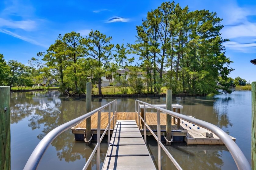 This unique waterfront oasis is located directly on the Black - photo 30