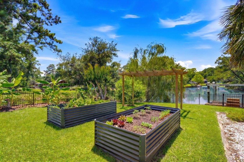 This unique waterfront oasis is located directly on the Black - photo 31