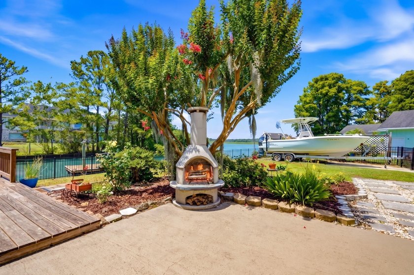 This unique waterfront oasis is located directly on the Black - photo 33