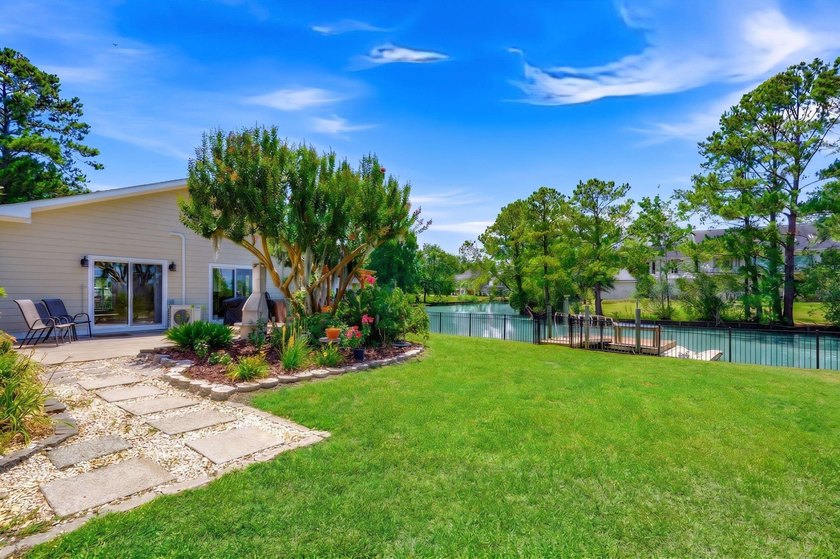 This unique waterfront oasis is located directly on the Black - photo 34