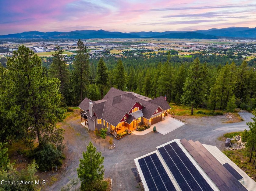 Stunning sunsets frame this custom designed Craftsman that sits - photo 5