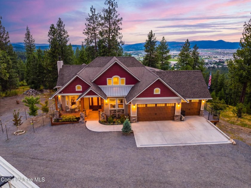 Stunning sunsets frame this custom designed Craftsman that sits - photo 7