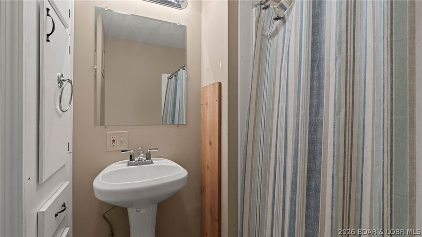 Priced to move and set along the edge of a serene 20-acre - photo 20