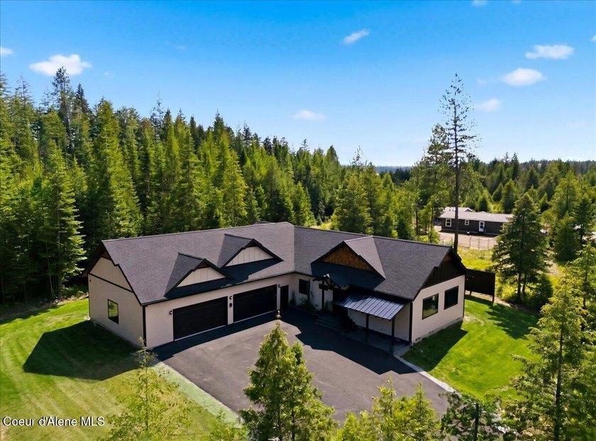 Luxury New Construction on 5 Private Wooded Acres! This - photo 4