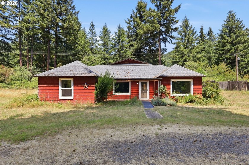 So much potential in this lovely riverfront property located - photo 2
