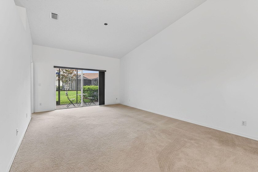 A MUST-See! This charming NEW 2025 ROOF and lakefront villa is - photo 14