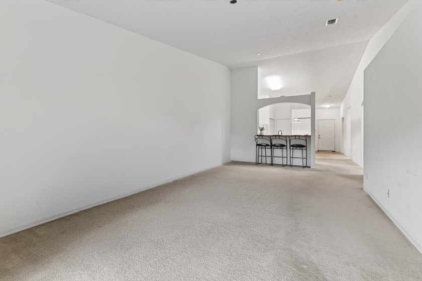 A MUST-See! This charming NEW 2025 ROOF and lakefront villa is - photo 15