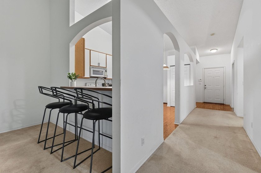 A MUST-See! This charming NEW 2025 ROOF and lakefront villa is - photo 16
